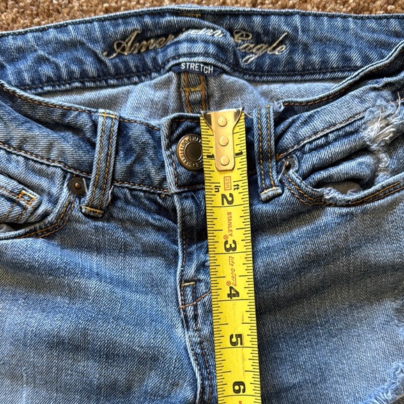 American Eagle Low Rise Distressed Blue Jeans. Size 2. - Picture 2 of 6